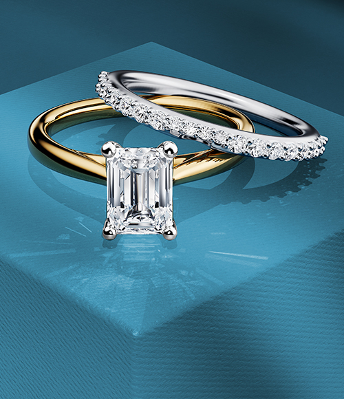 Birks diamond engagement ring on a blue background