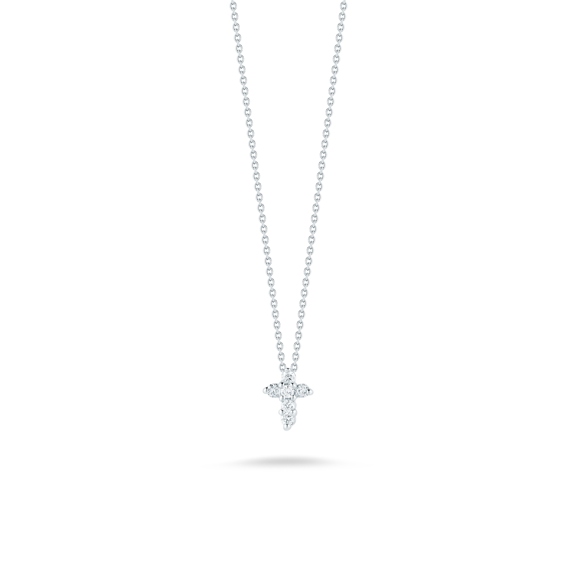 Tiny diamond cross pendant hotsell